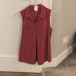 Raspberry colored sleeveless button up top